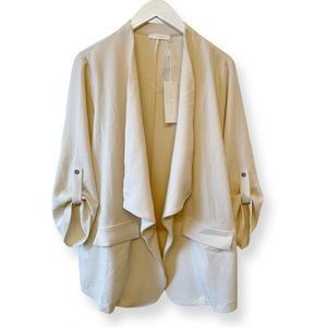 Casual cream blazer. Never worn.